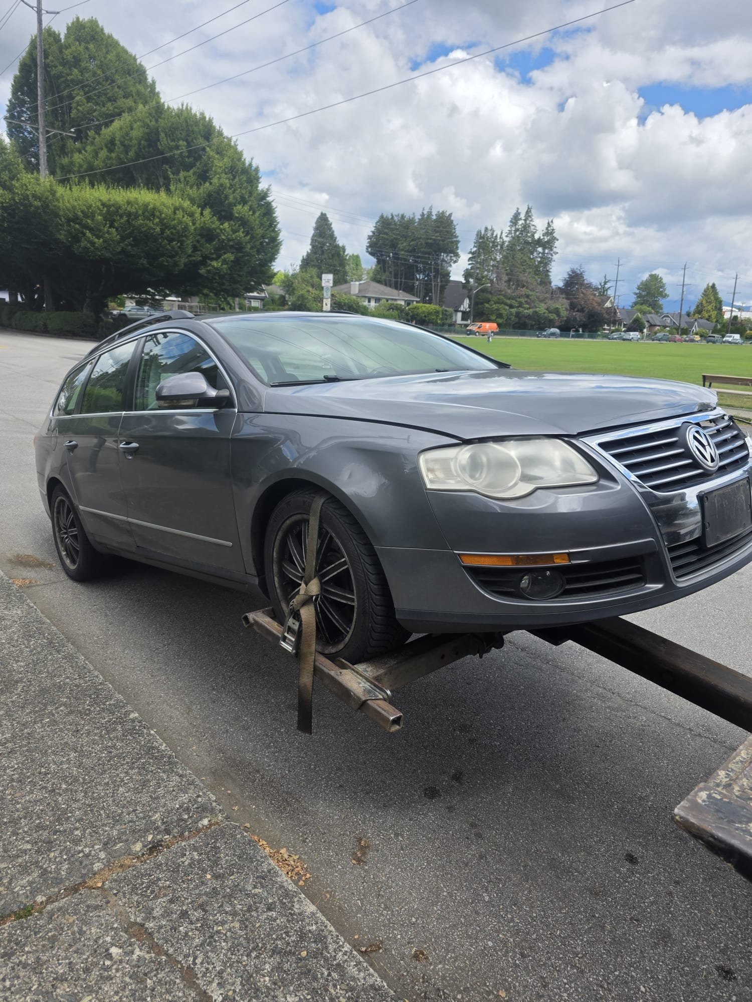 Cash-for-cars pickup on a Bowen Island driveway